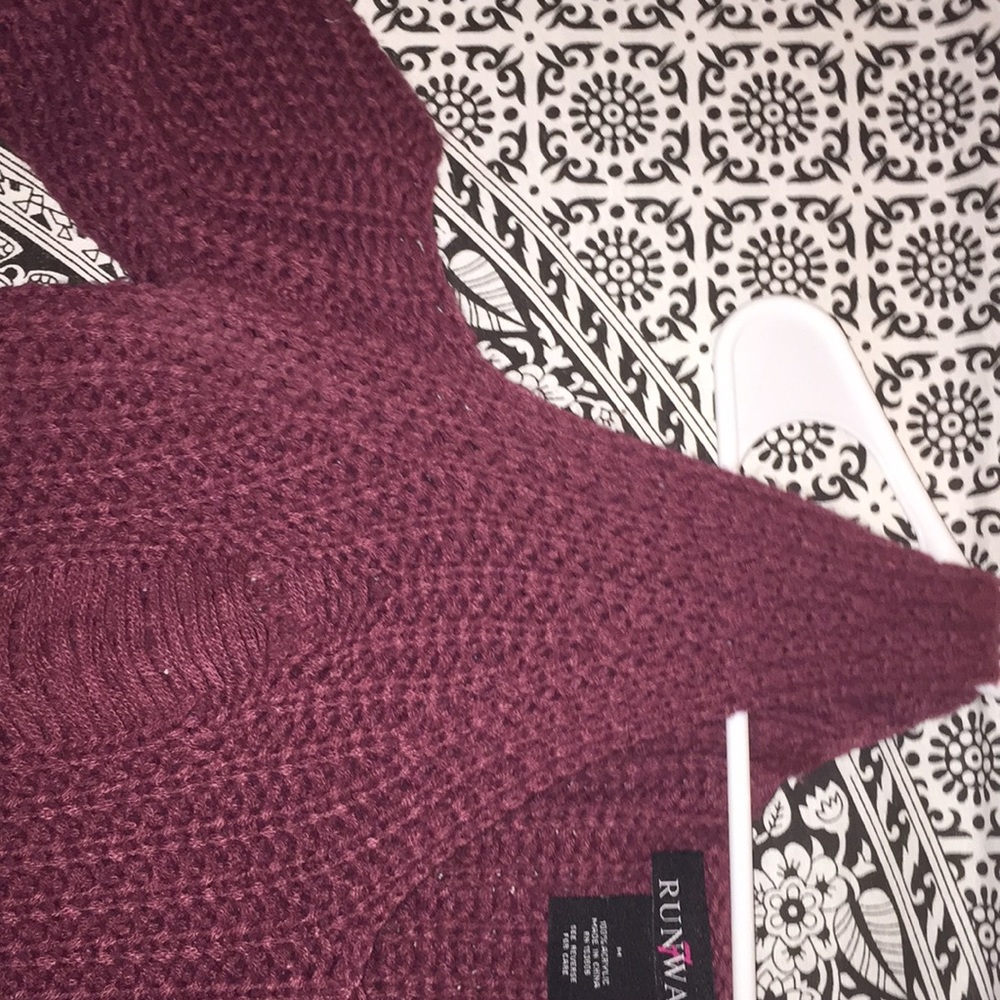 Long sleeve distressed sweater